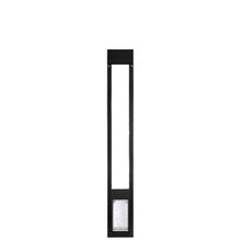 Black sliding glass door insert with a pet door.