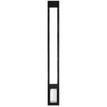 Black sliding glass door insert with a pet door at the bottom.
