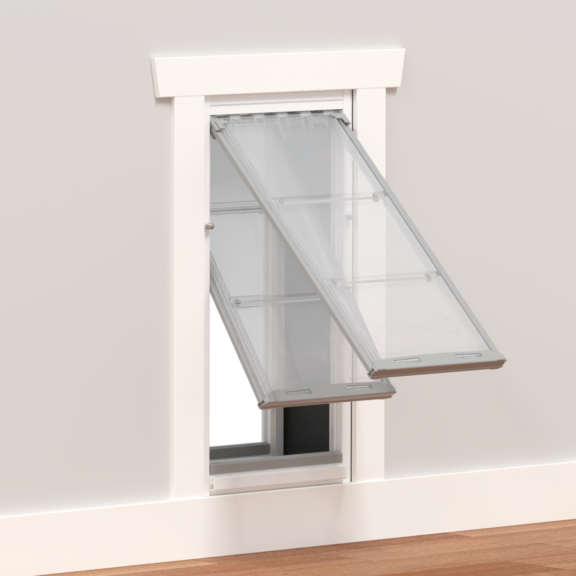 A pet door with clear flaps installed in a wall.
