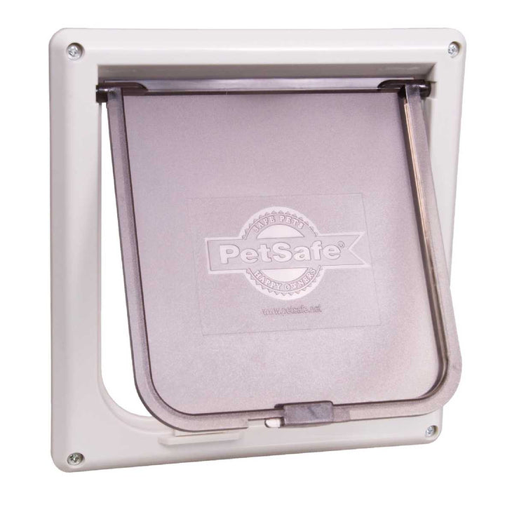 A PetSafe pet door with a white frame and translucent door.