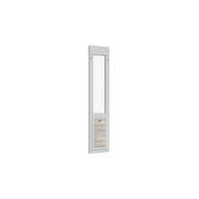 A white pet door with a beige pet flap.
