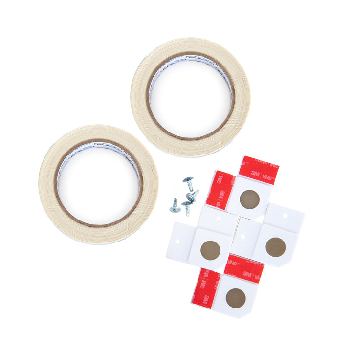 Two rolls of double-sided tape, four screws, and several 3M VHB adhesive pads on a white background.