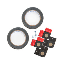 Two rolls of black tape, five screws, and eight black squares with tan circles on a white background.