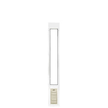 A white pet door for a sliding glass door.