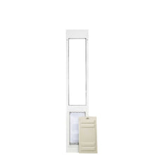 White-framed sliding glass door insert with a pet door and a light beige cover.