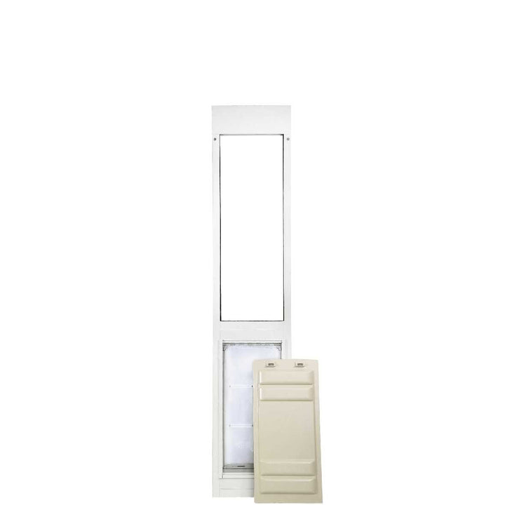 A white pet door insert for sliding glass doors, with a pet door cover leaning against it.