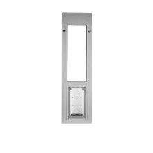 A silver sliding glass door pet door insert.