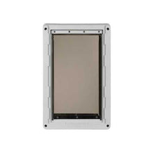 A white pet door with a flexible transparent flap.