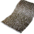 A rectangular sheet of rough, dark material with silver speckles.