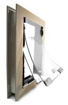 A pet door with a flexible transparent flap in a metal frame is shown at an angle against a white background_Color_Tan