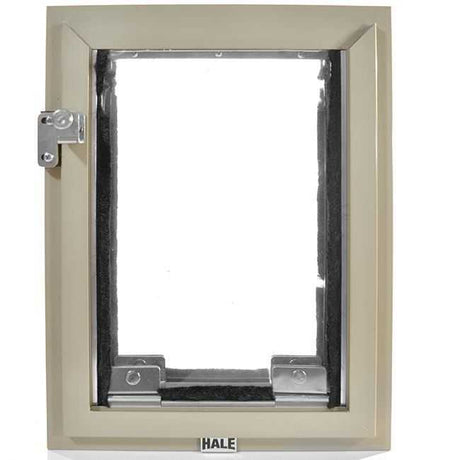A Hale pet door with a tan frame.