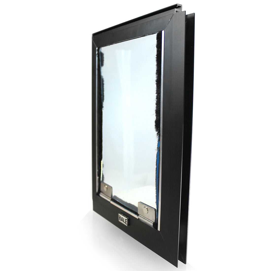 A Hale brand pet door with a black frame and transparent flap.