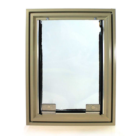 A beige framed pet door.