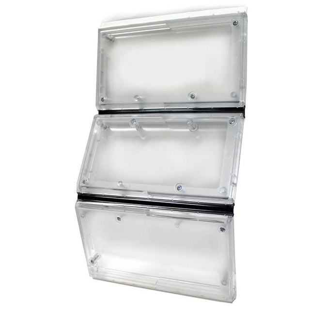 Three stacked, clear plastic electrical enclosures are connected by black bands.