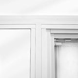 Close-up of a white window frame with a semi-transparent curtain.