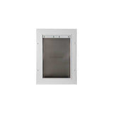 A white pet door with a flexible, tinted flap.