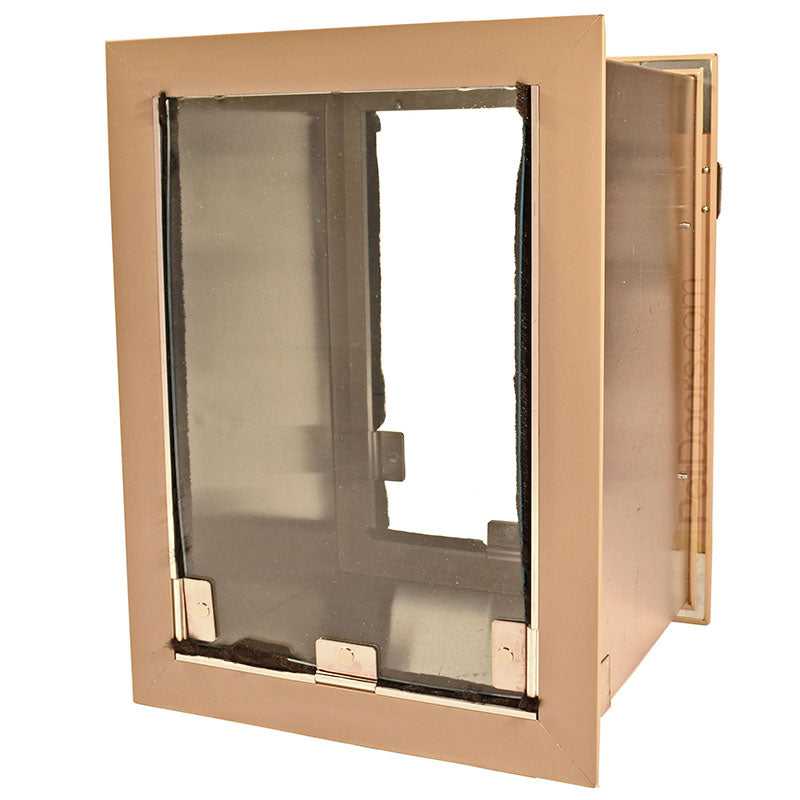 A pet door with a bronze-colored frame and a tinted, transparent flap.