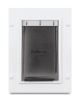 A PetSafe brand pet door in a white frame.