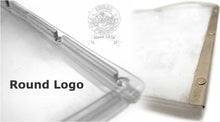 Clear pet door frame with a company logo in the background.