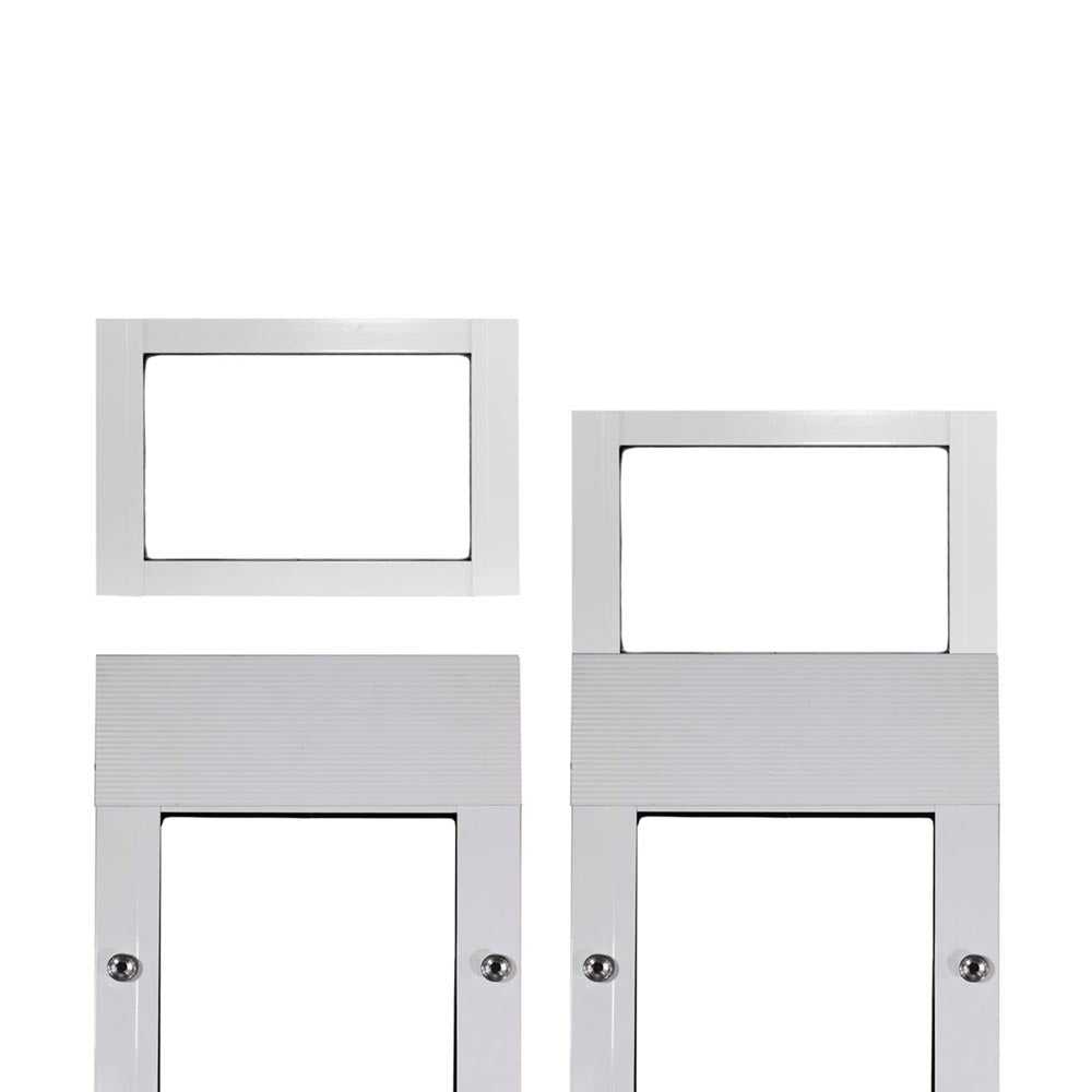 Two white metal frames with rectangular openings, one detached.