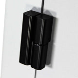 Close-up of a black hinge on a white surface.